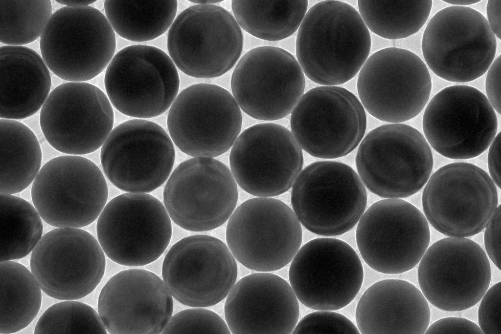 Gold nanoparticles produced using a Syrris Orb jacketed reactor, viewed under a microscope