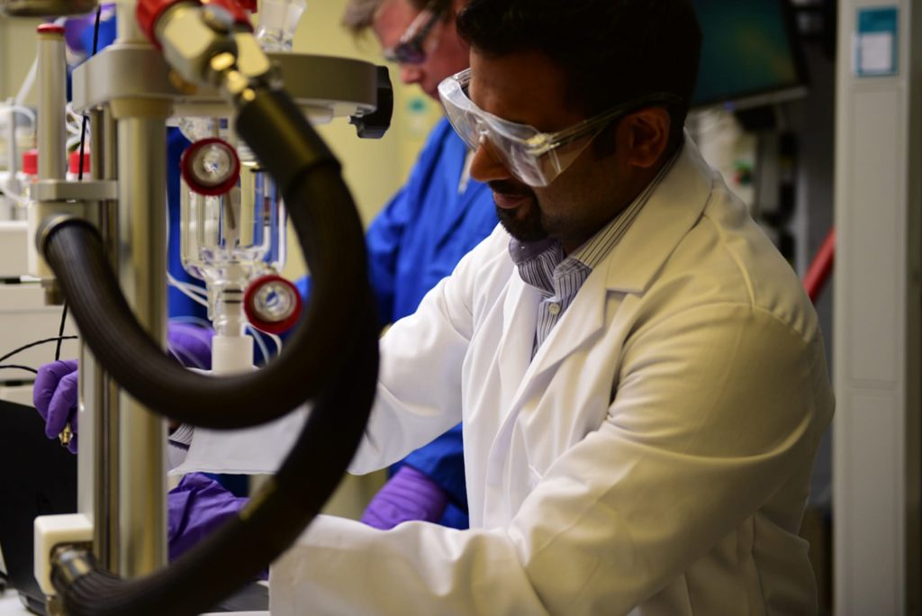 Syrris Atlas HD Calorimeter in use by a chemist