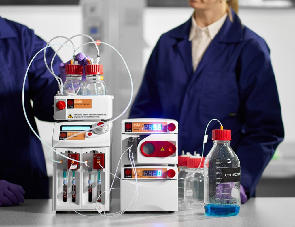 Syrris Asia Starter System close-up chemist in lab