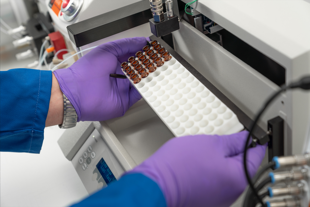 A chemist working on drug discovery and drug development using a Syrris Asia flow chemistry system