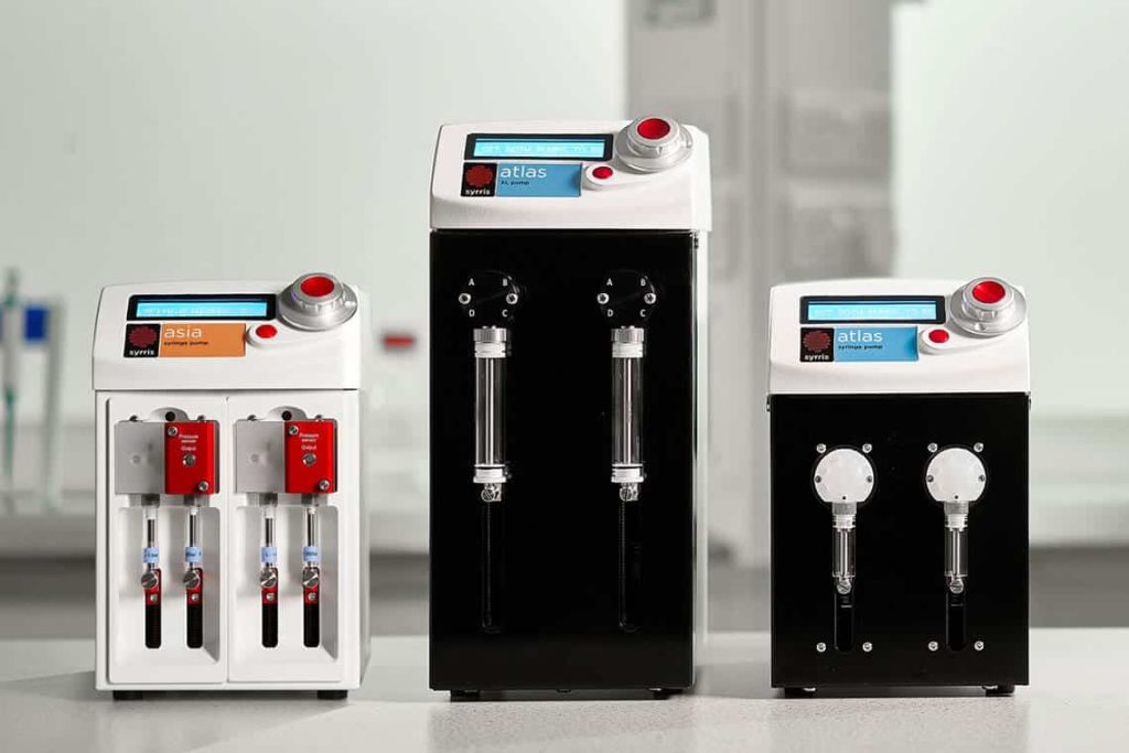 Syrris Asia Syringe Pump close-up chemist in lab